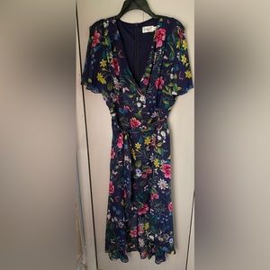 Women’s dress.  Dark blue with pastel flowers.